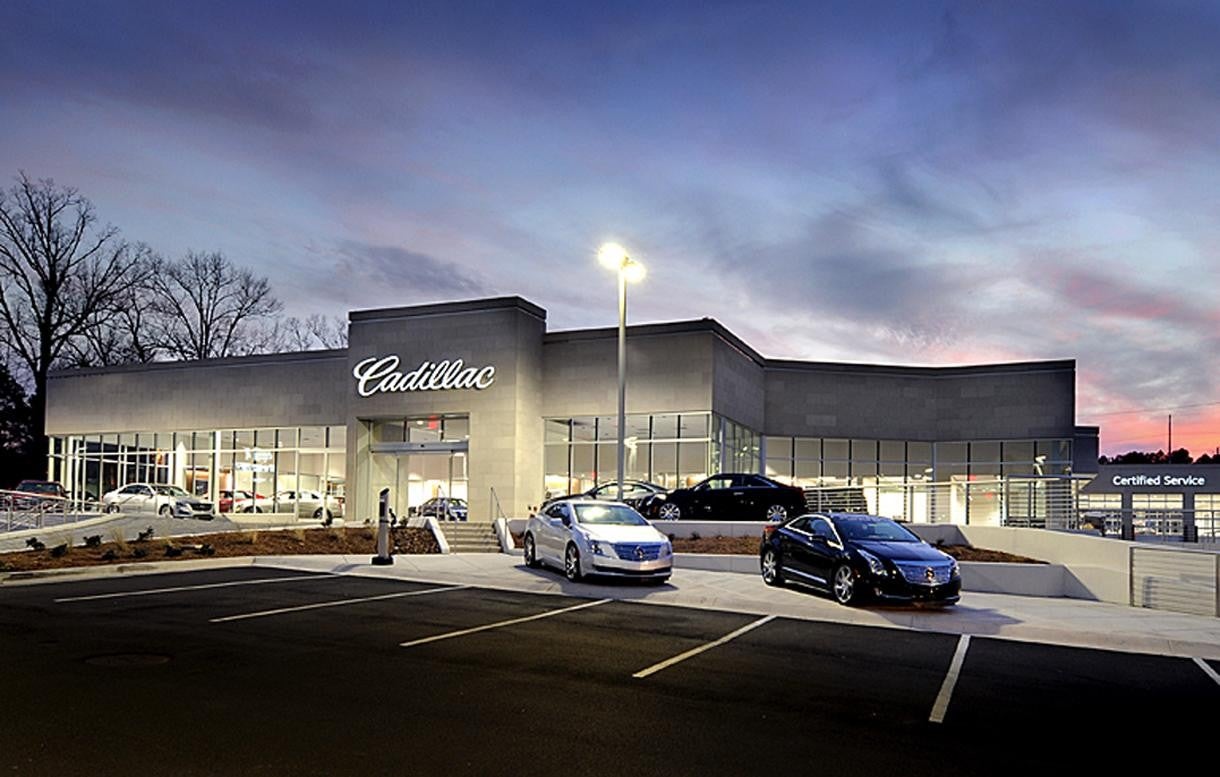 Capital Cadillac Of Atlanta Dealership Exterior at Night